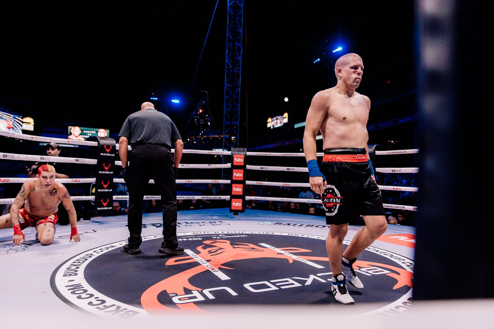 Joe Lauzon stands over a knocked-down opponent at BKFC 92 at Fenway Park