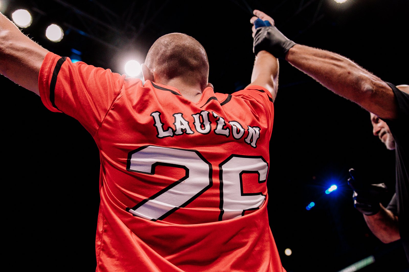 Joe Lauzon with his arms raised after winning at BKFC 92 at Fenway Park
